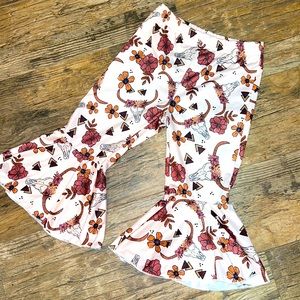 Childrens size bell bottoms with bull head print